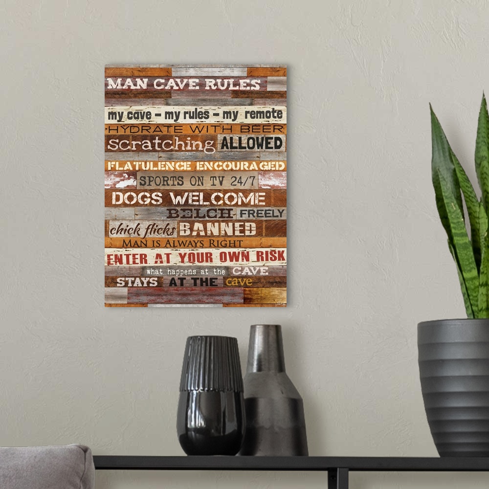 A modern room featuring Typography artwork of man cave rules, with text against a wooden background.