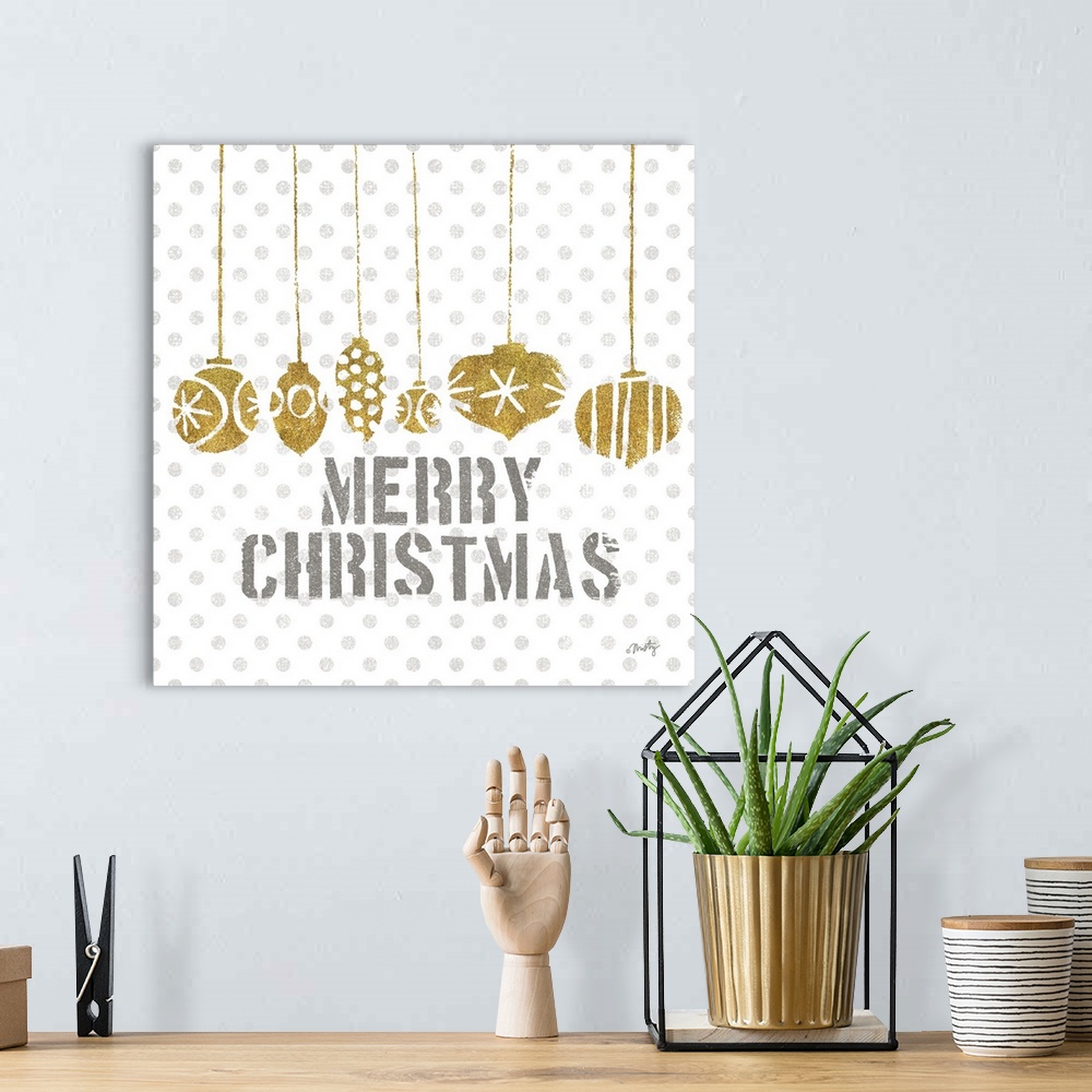 A bohemian room featuring Hanging ornaments in gold glitter coloring hover over the holiday sentiment: Merry Christmas, wit...