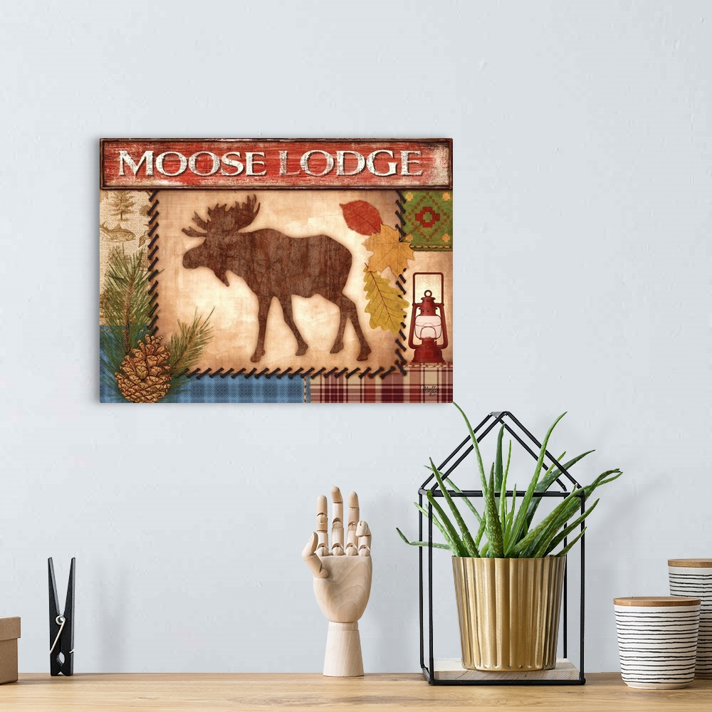 A bohemian room featuring Cabin decor artwork perfect for roughing it in the woods.