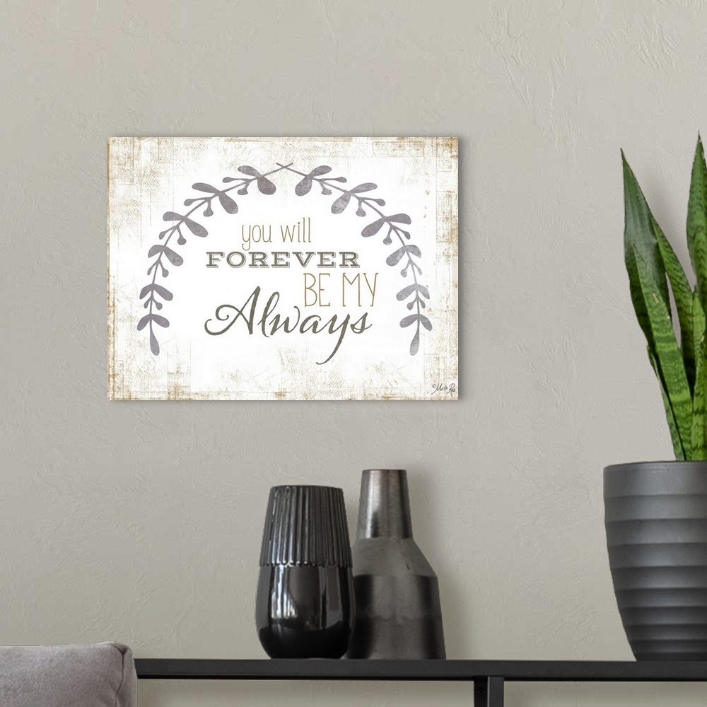 A modern room featuring Message of love framed by two leafy sprigs on a textured background.