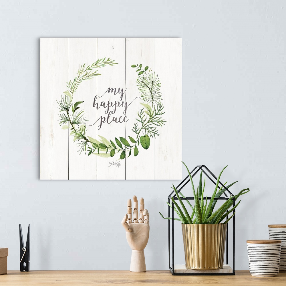 A bohemian room featuring "My Happy Place" framed by delicate greenery on a white shiplap background.