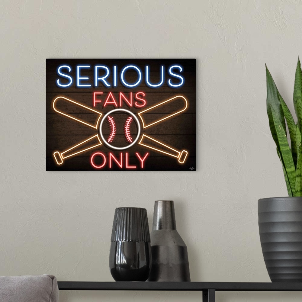 A modern room featuring Retro sign resembling neon lights which reads "Serious Fans Only."