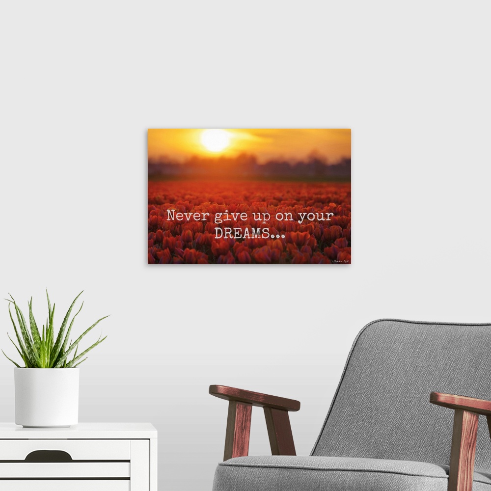 A modern room featuring Fields of red tulips under fiery sunset clouds, with inspirational text.