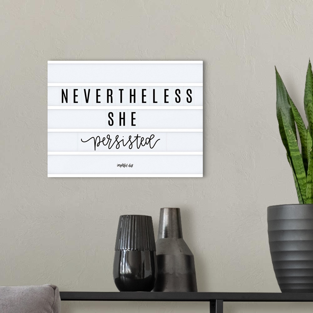 A modern room featuring Nevertheless She Persisted