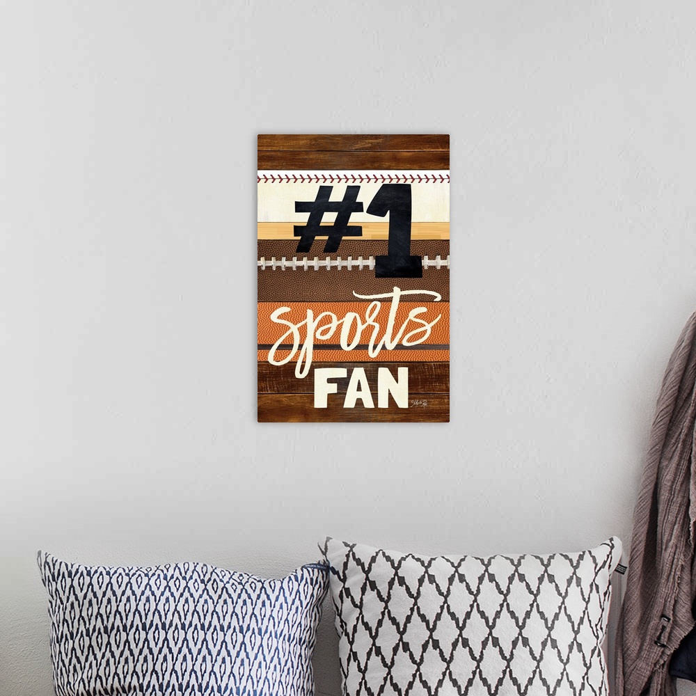A bohemian room featuring Sports-themed typography art with a baseball, football, and basketball stripe design.