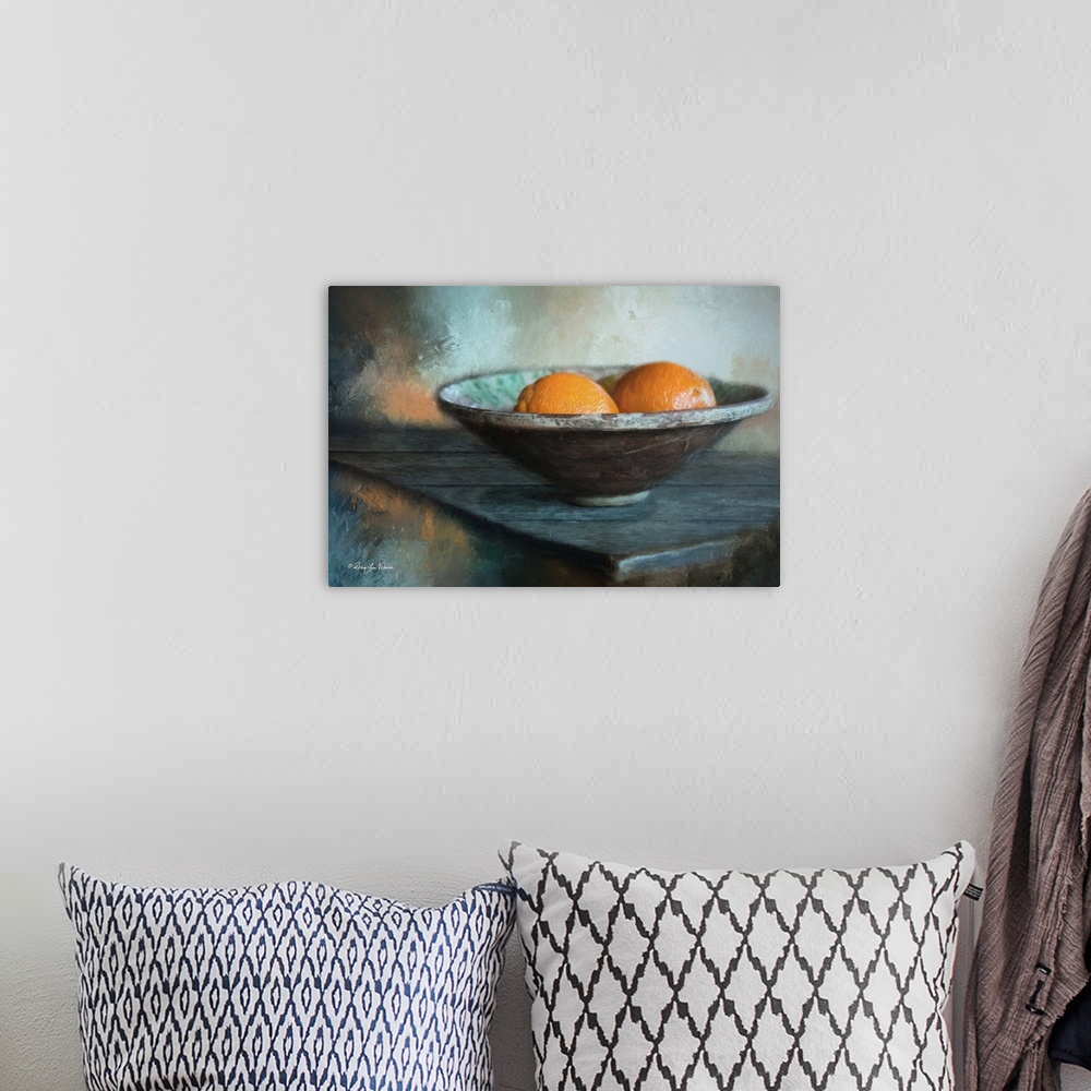 A bohemian room featuring Decorative artwork of a still-life image of a bowl of oranges.