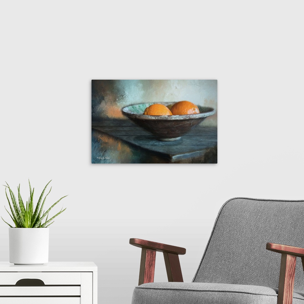 A modern room featuring Decorative artwork of a still-life image of a bowl of oranges.