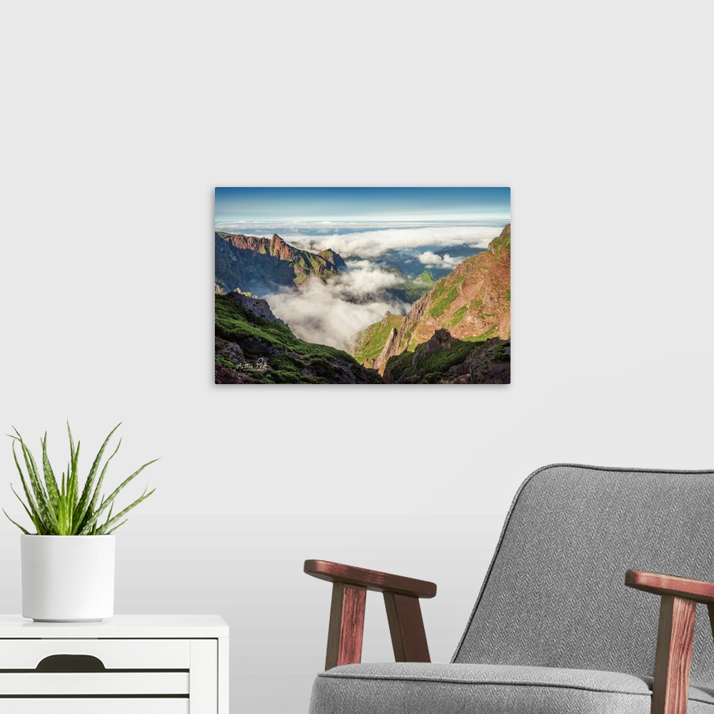 A modern room featuring Over the Clouds