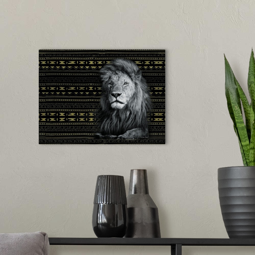 A modern room featuring Artwork of a resting lion, with a gold and black tribal pattern.