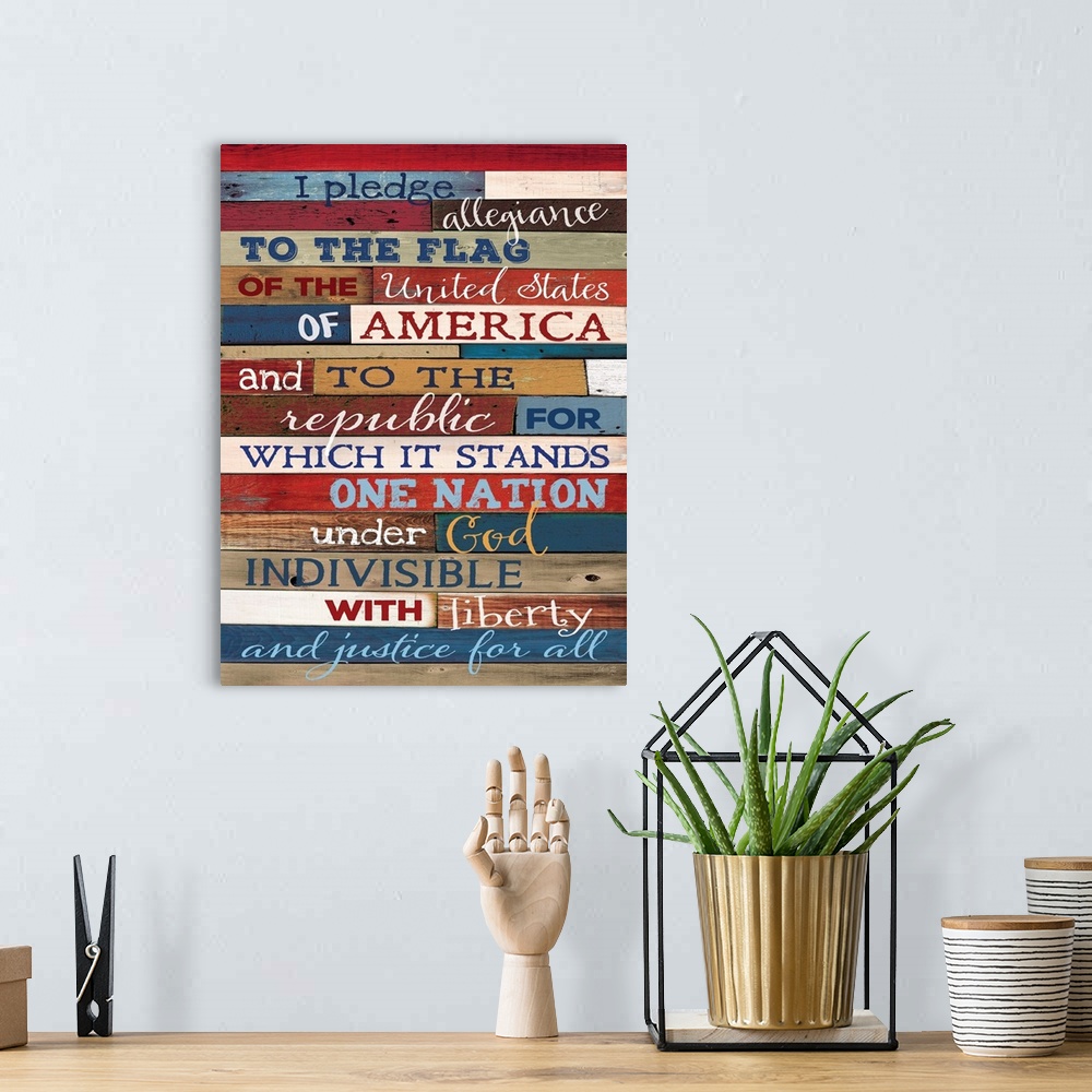 A bohemian room featuring Patriotic typography art against wooden surface in multiple colors.