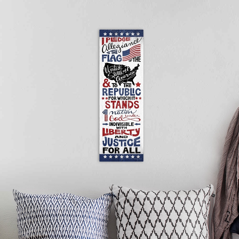 A bohemian room featuring Handlettered artwork of the Pledge of Allegiance in red, white, and blue, on a textured background.