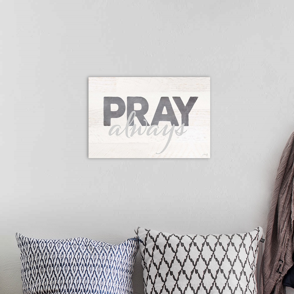 A bohemian room featuring Pray Always