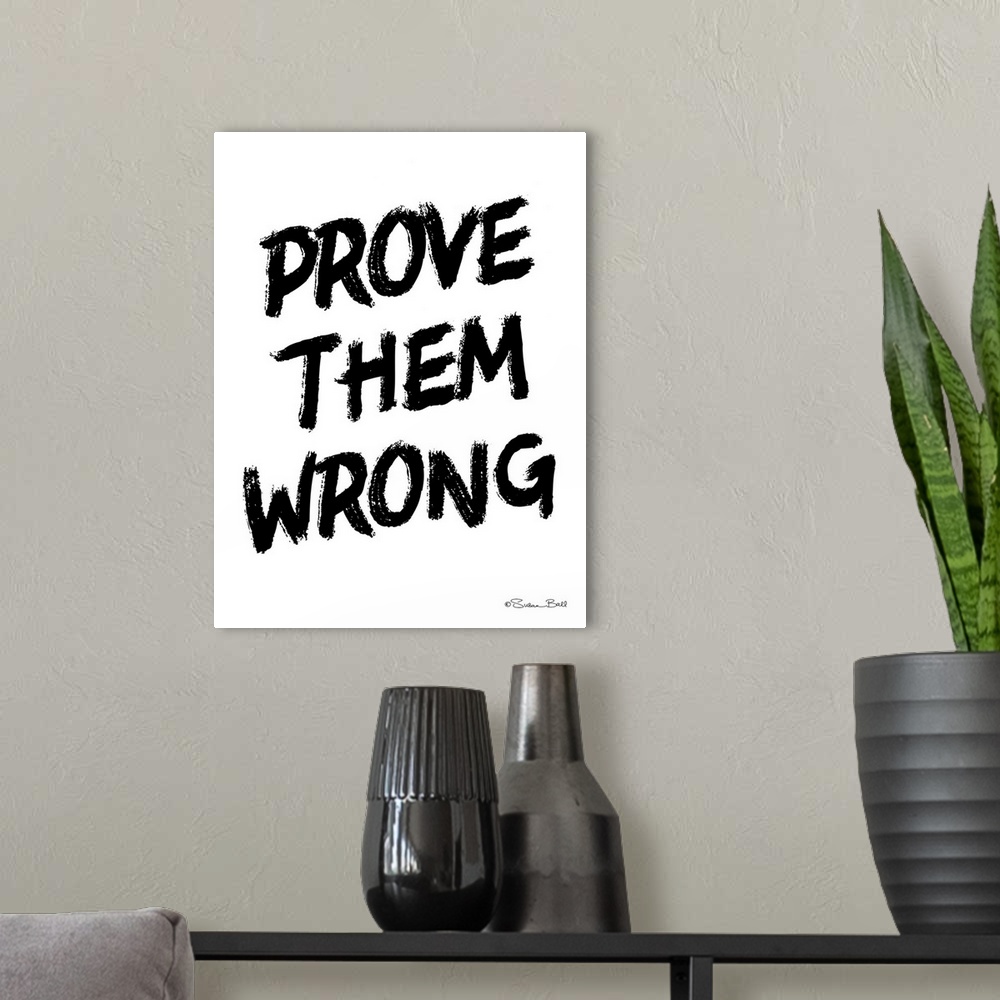 A modern room featuring Prove Them Wrong