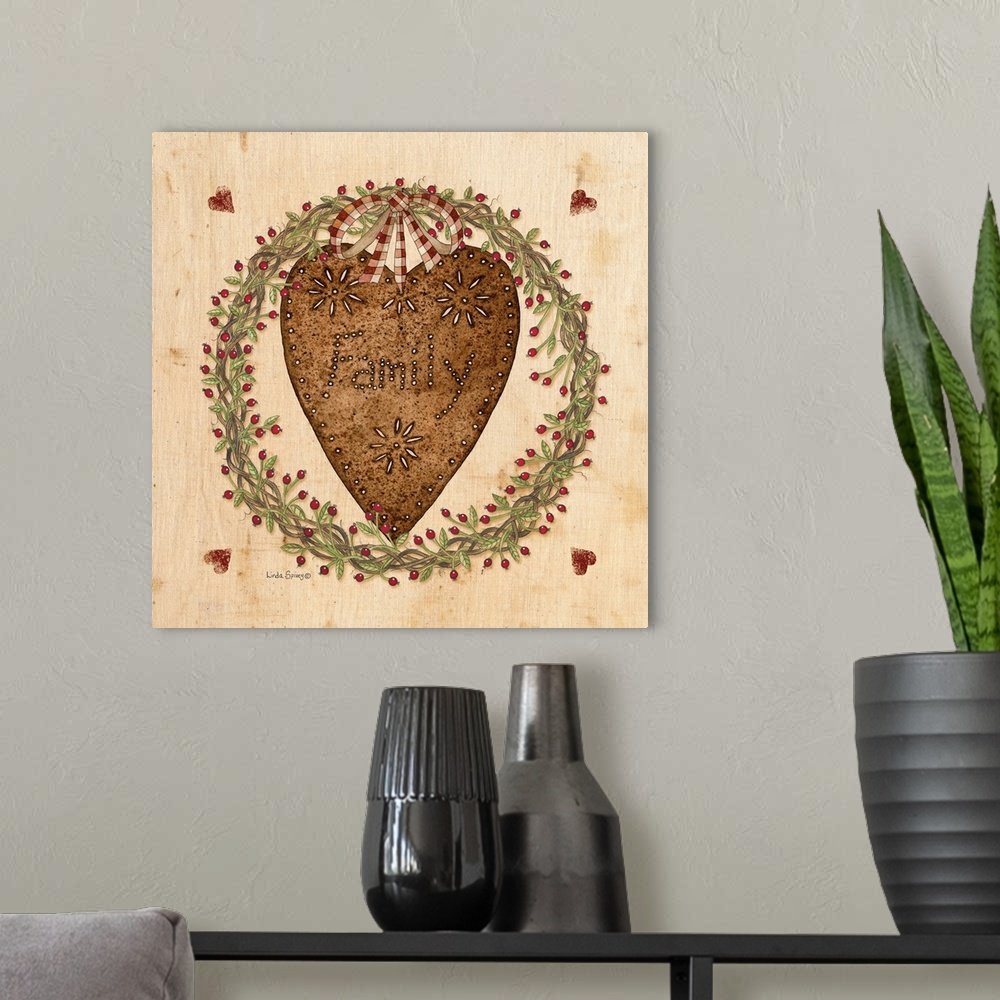 A modern room featuring Folk artwork featuring a rusty tin heart with nature wreath surrounding it.