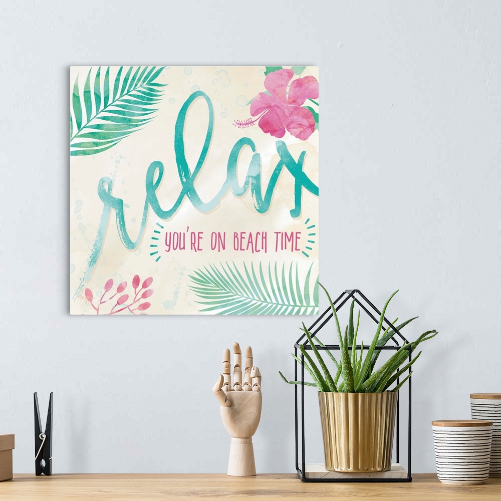 A bohemian room featuring Beach-themed artwork with "Relax" in large script with a motif of tropical leaves and flowers.
