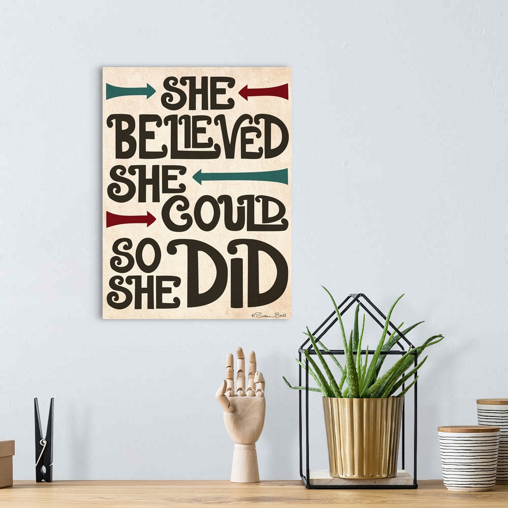 A bohemian room featuring Inspirational typography home decor artwork.
