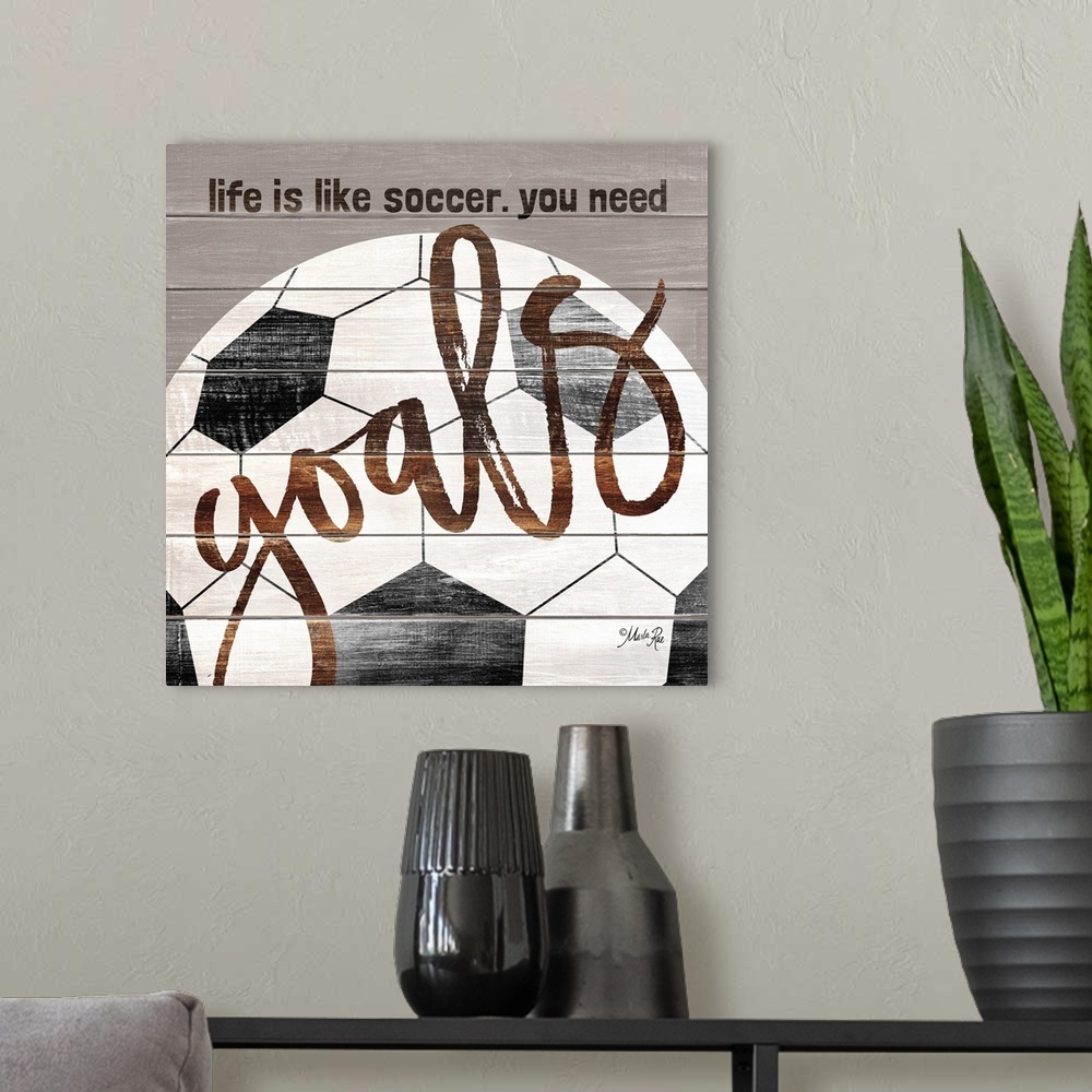 A modern room featuring Soccer themed typography art on a wooden board background.