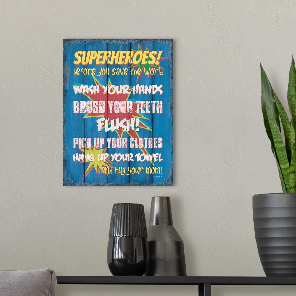 A modern room featuring Kids' typography art with a comic superhero theme, encouraging proper bathroom habits.