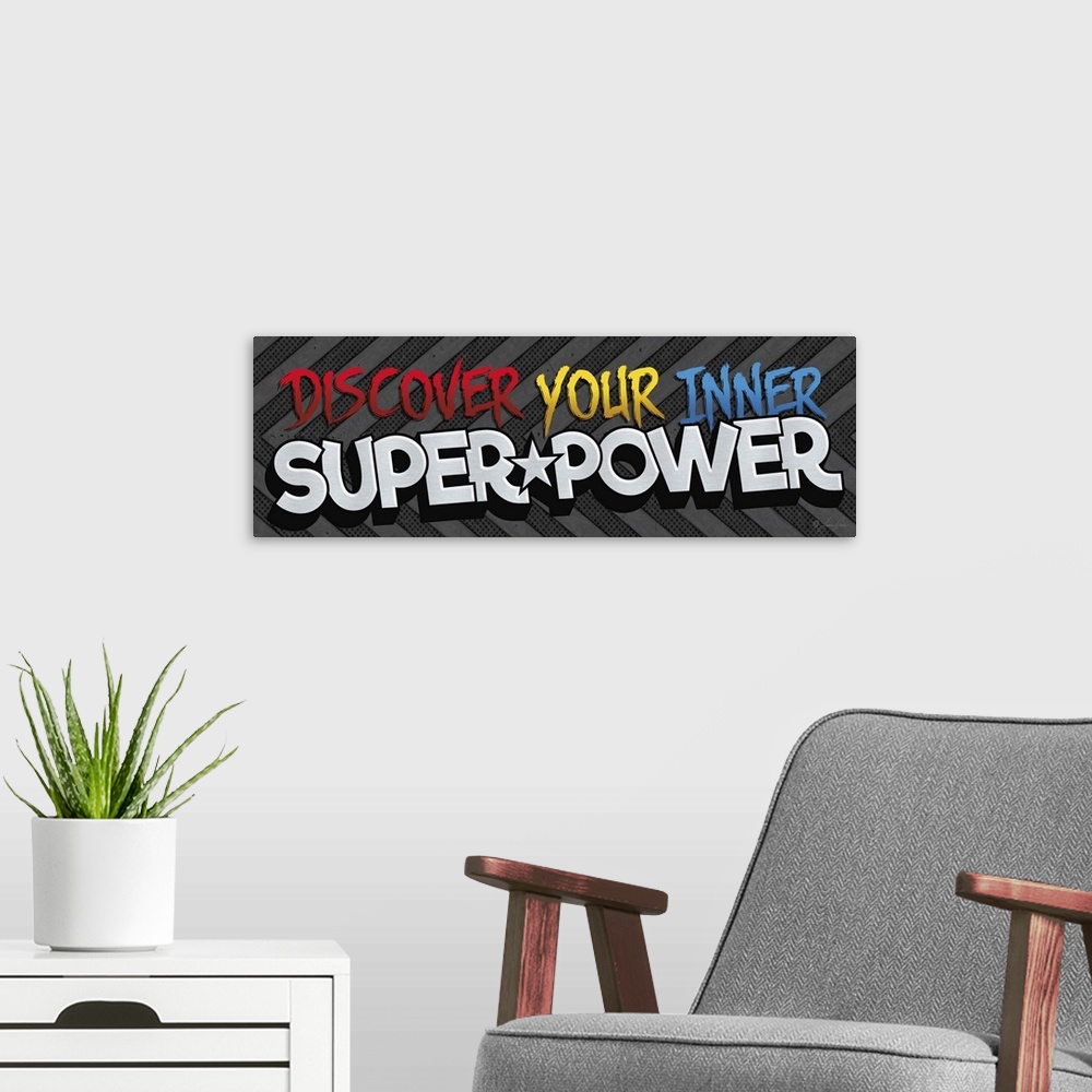 A modern room featuring Typography art reading "Discover your inner superpower" in exciting, bold lettering on a striped ...