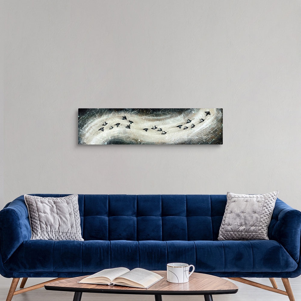 A modern room featuring Contemporary art print of a flock of birds in flight, in a swooping formation.