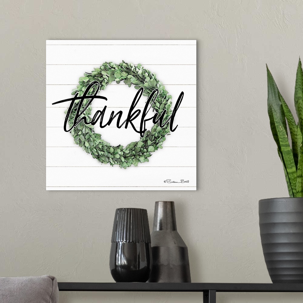 A modern room featuring Thankful Boxwood Wreath