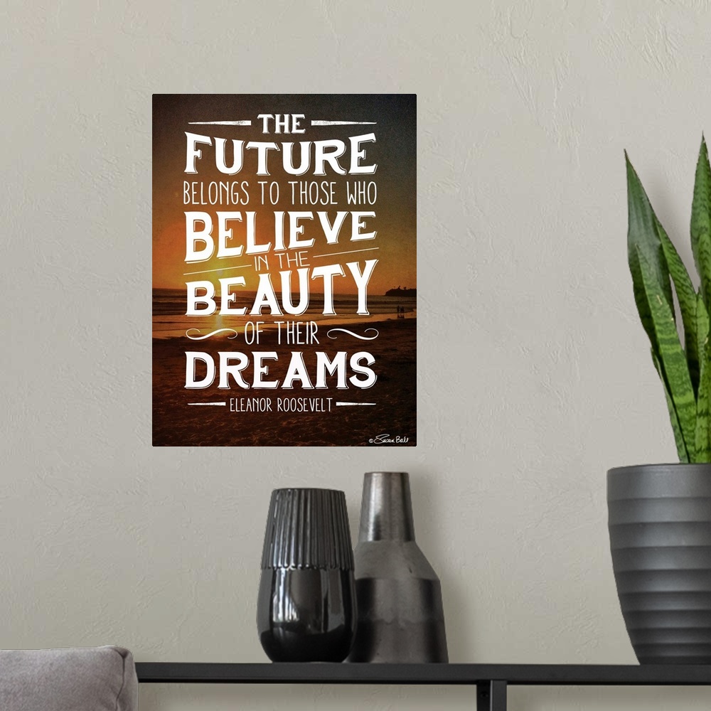 A modern room featuring Inspirational quote in white lettering against a photograph of a beach at sunset