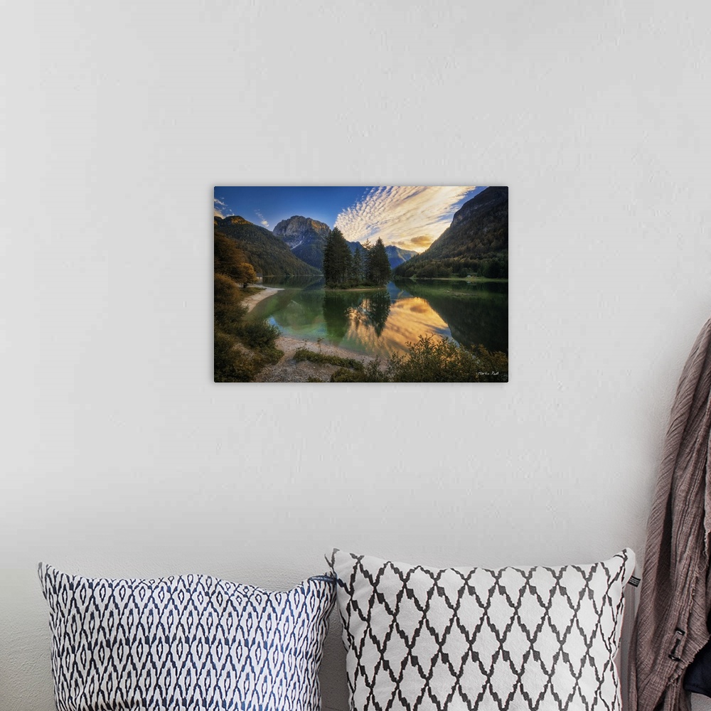 A bohemian room featuring Peaceful mountain lake under a blue sky with clouds in the afternoon.