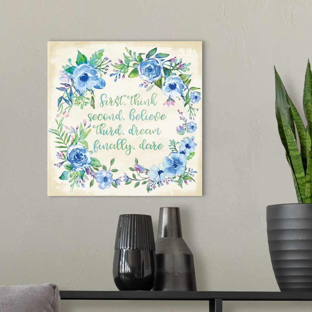 A modern room featuring Inspiring quotation surrounded by a wreath of blue flowers and green leaves.