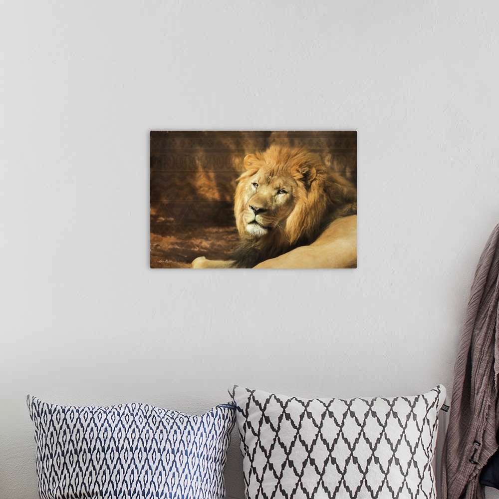 A bohemian room featuring Photograph of a lion against a tribal patterned background.