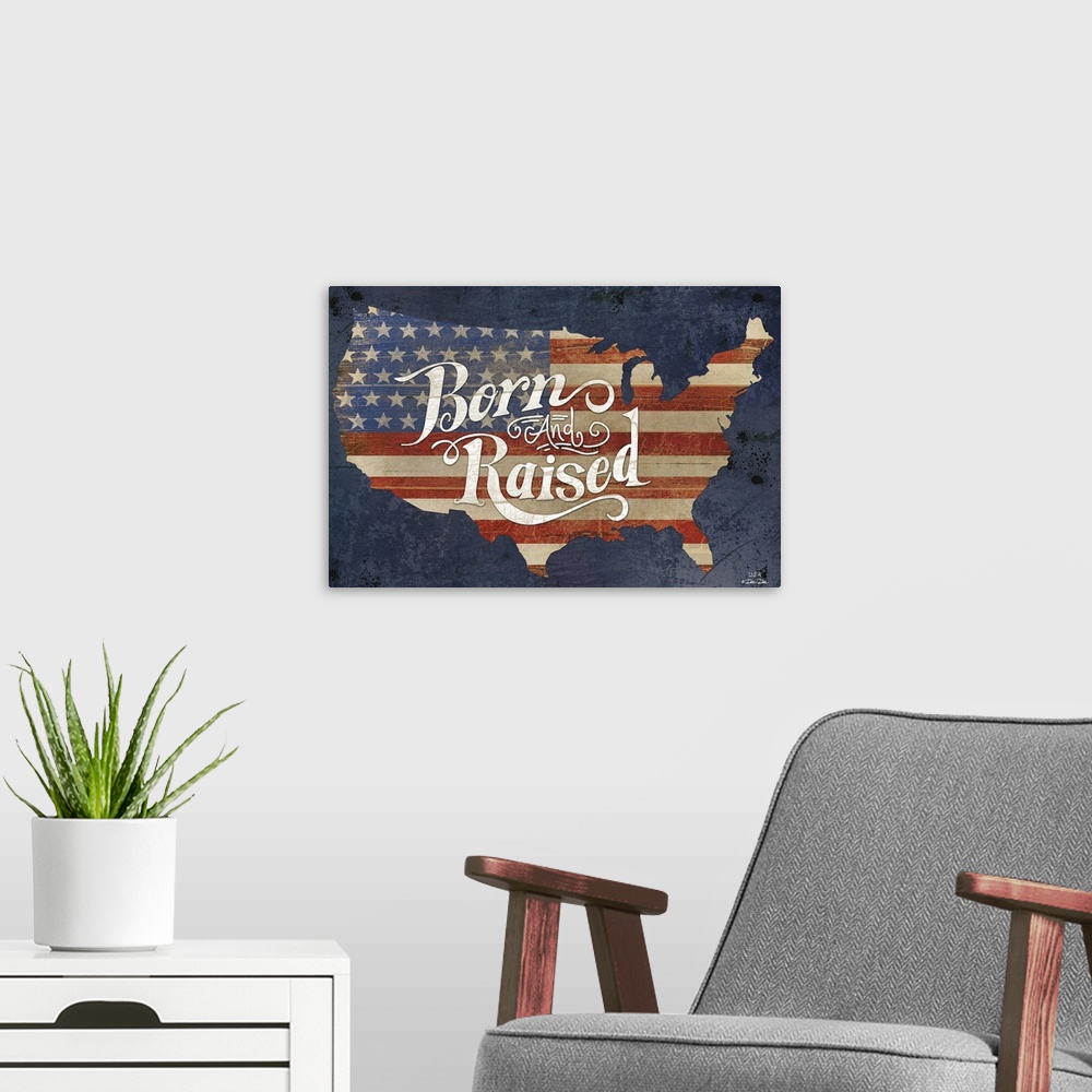 A modern room featuring The American flag in the shape of the United States with "Born and Raised" in decorative text.