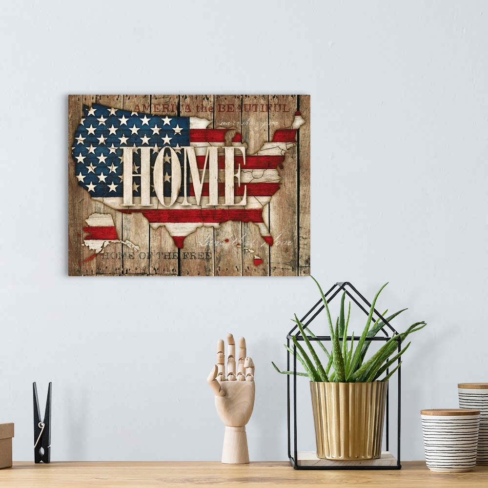A bohemian room featuring Artwork of an outline of the USA filled with the American flag.