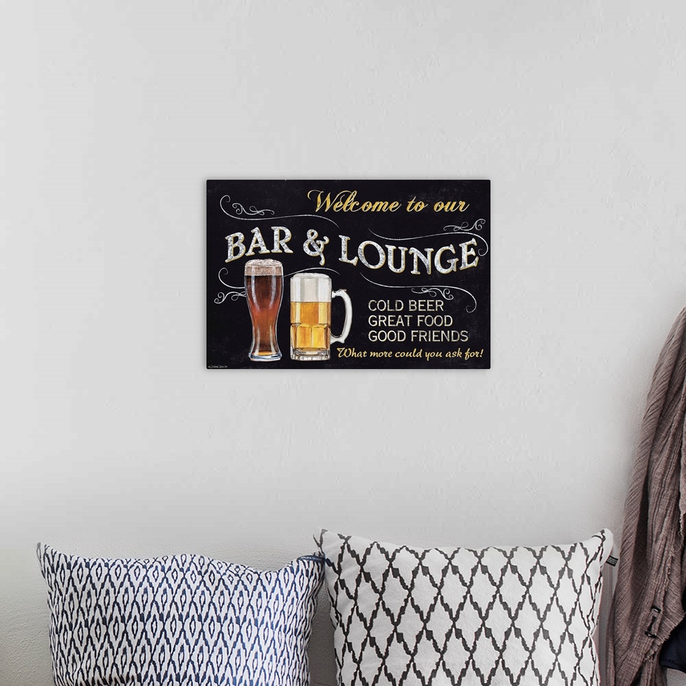 A bohemian room featuring A chalkboard style sign with a beer glass and mug.