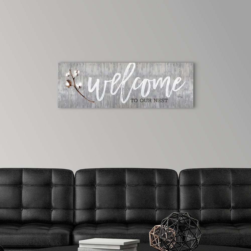 A modern room featuring "Welcome to Our Nest" on a gray distressed metal background.