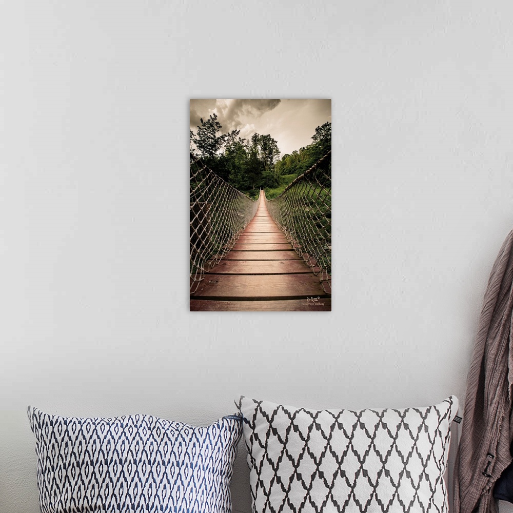A bohemian room featuring Photograph of a bridge walkway.