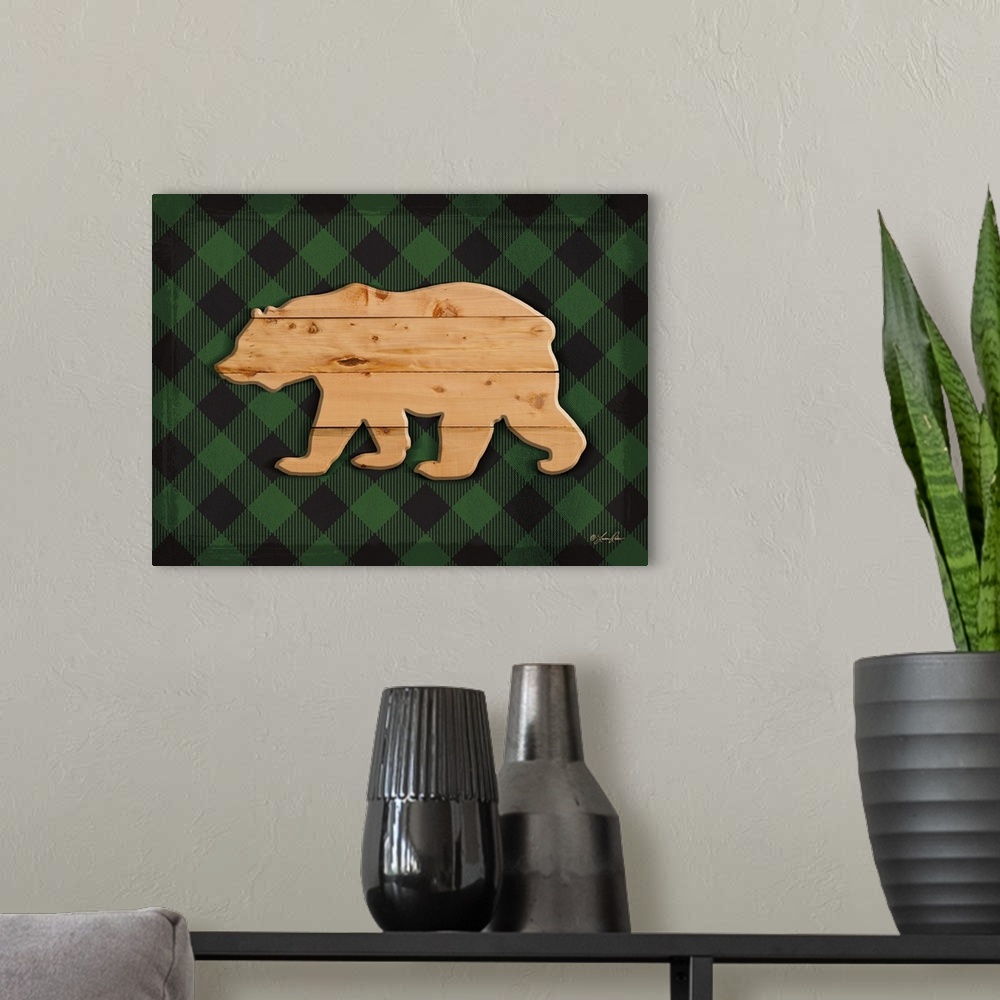 A modern room featuring Silhouette of a bear with a wooden appearance over a green plaid background.