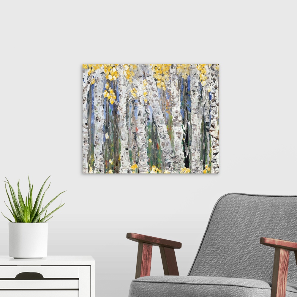 A modern room featuring Contemporary art print of a forest of birch trees with bright yellow leaves.