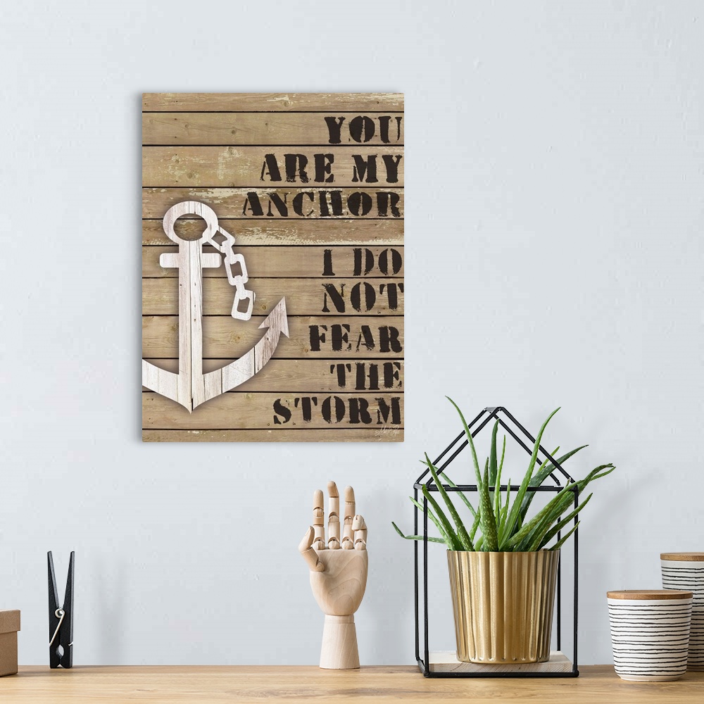 A bohemian room featuring Nautical themed typography home decor art.