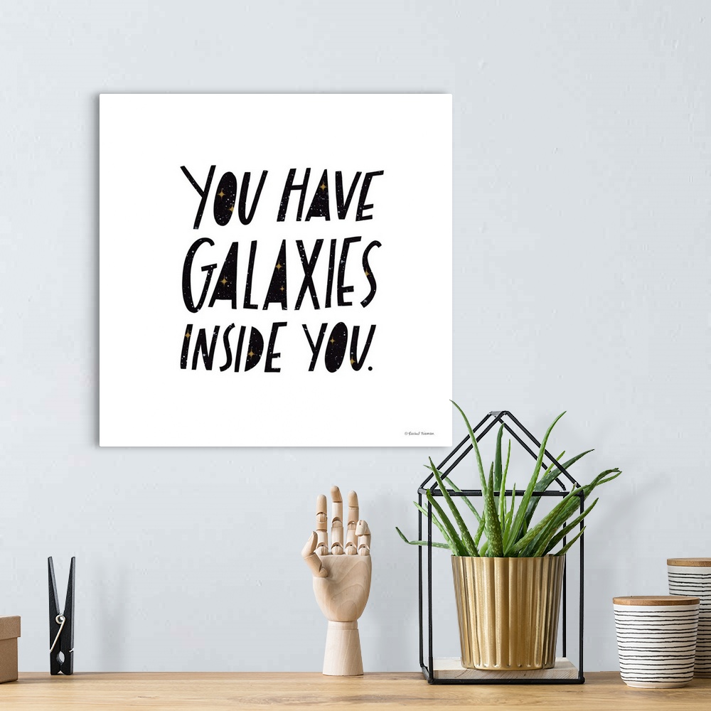 A bohemian room featuring You Have Galaxies Inside You