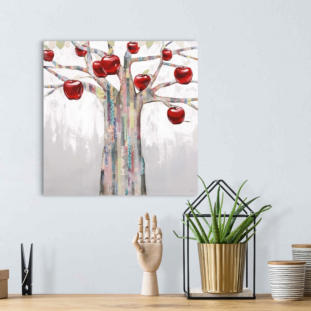 A bohemian room featuring Contemporary painting of a tree with bright red apples hanging form the branches.