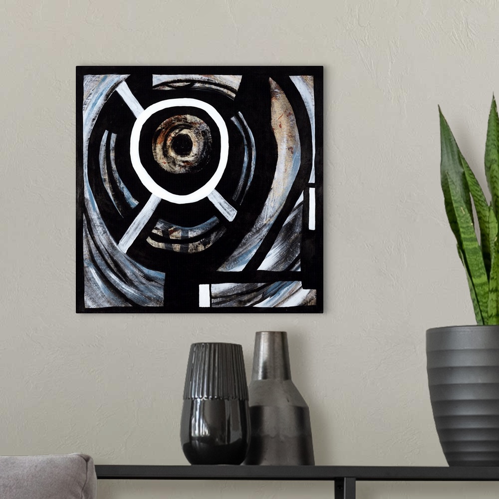 A modern room featuring Square abstract painting with layers of circles creating depth and movement.