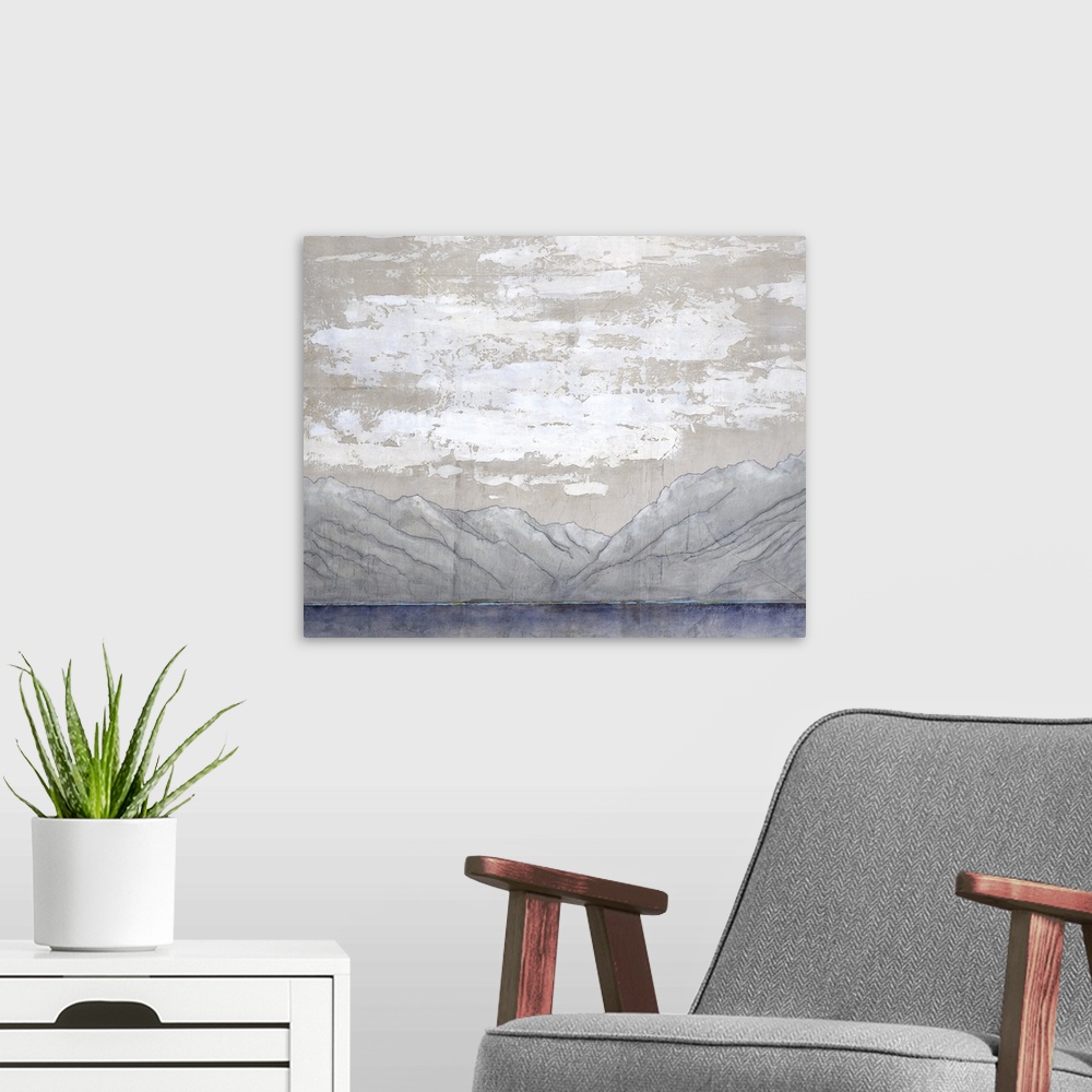 A modern room featuring Contemporary landscape painting of slightly washed out mountain range and textured clouds in fron...