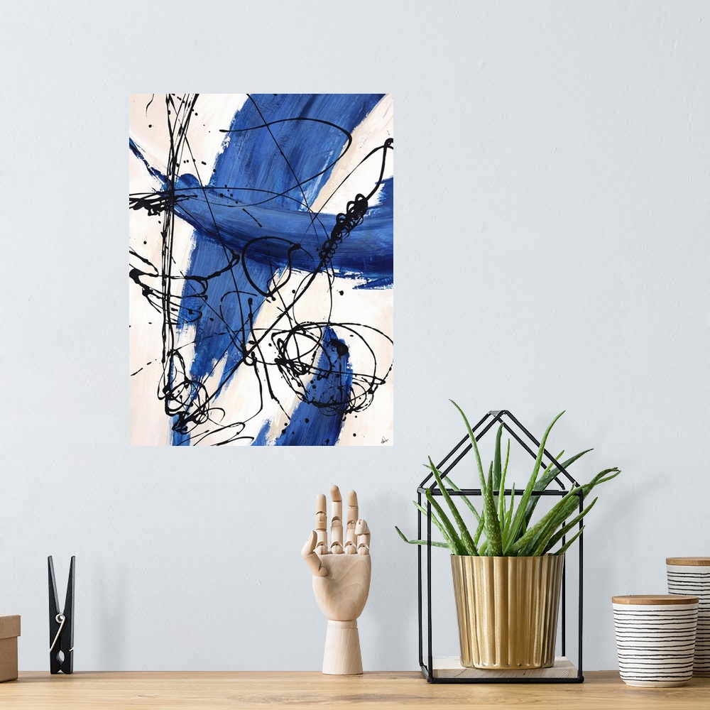 A bohemian room featuring Abstract painting, with bright blue paint swipes and dark black thin line splatters.