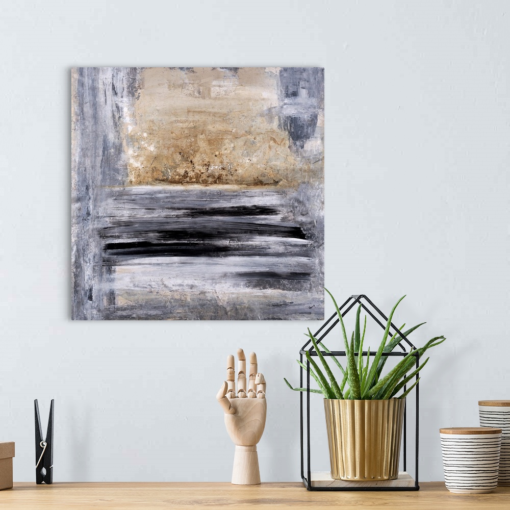 A bohemian room featuring Square abstract painting in black, gray, white, and gold hues.