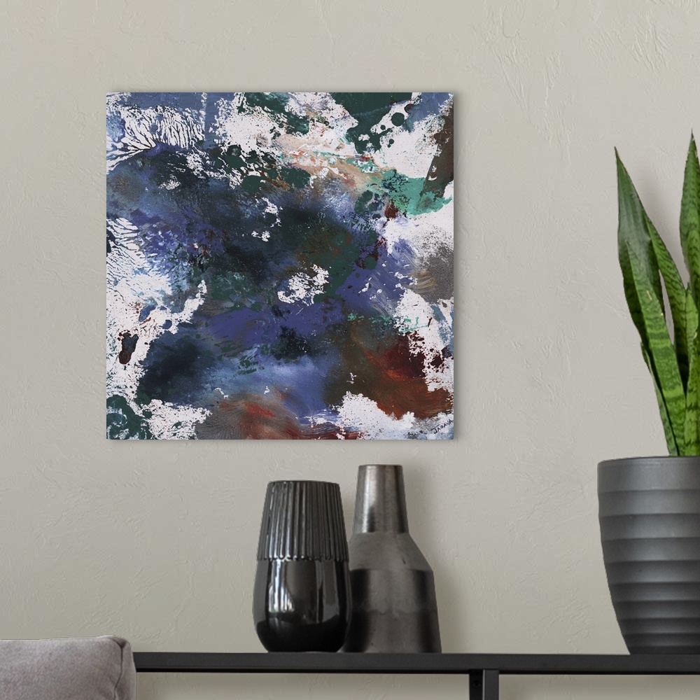A modern room featuring Square splattered abstract painting created with shades of blue, green, gray and burnt orange.
