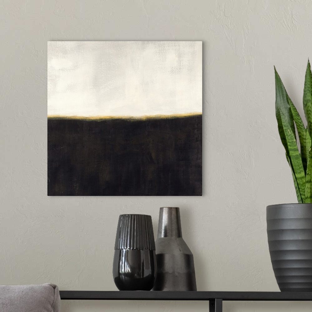 A modern room featuring Square abstract with a cream colored top, thin gold line going horizontally through the center an...