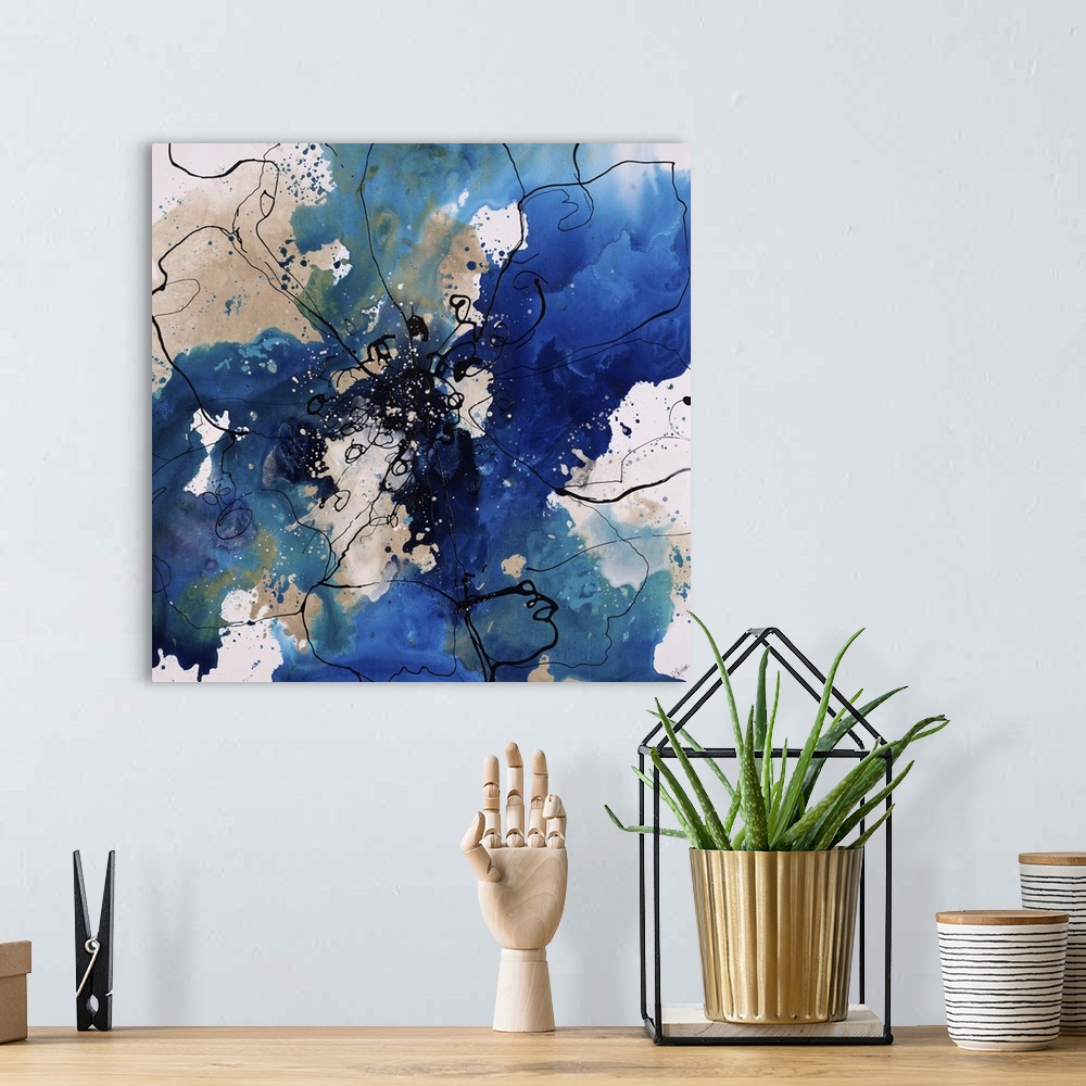 A bohemian room featuring Abstract painting using bright blue and gray colors in radial splashes almost appearing ad flowers.