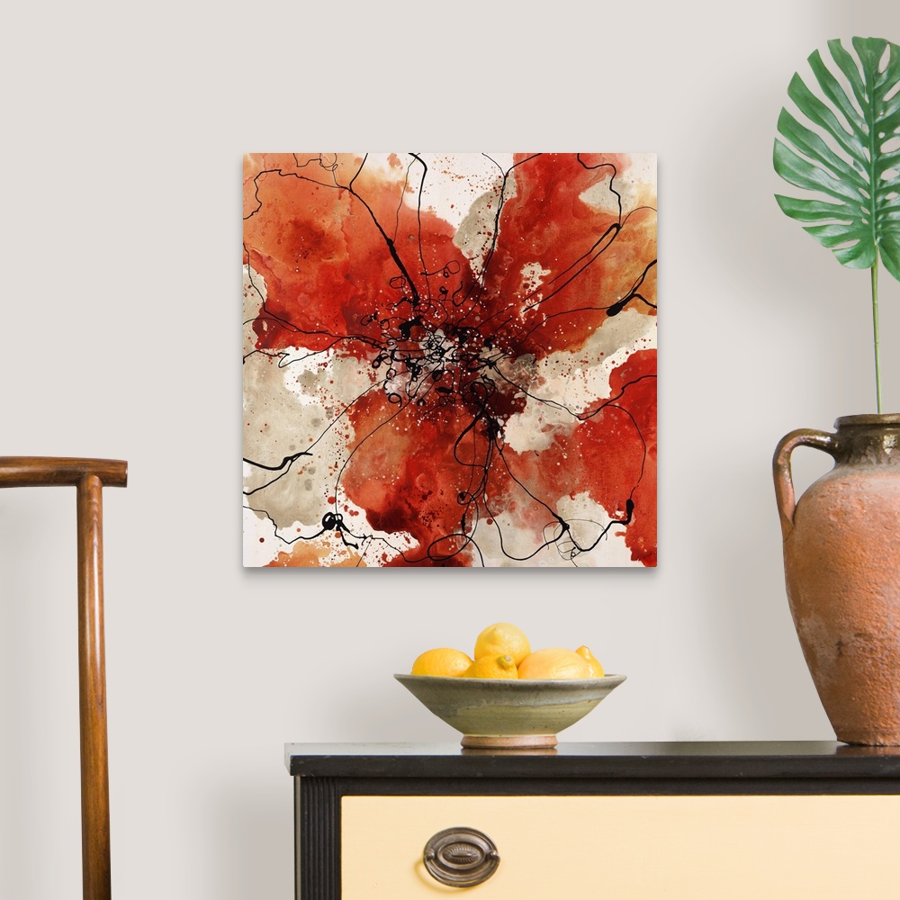A traditional room featuring Abstract painting using earth tones in radial splashes almost appearing ad flowers.