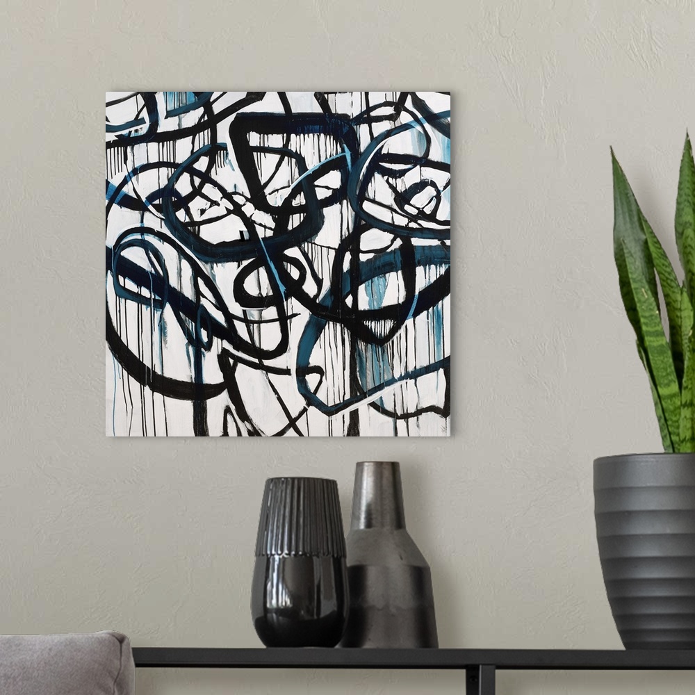 A modern room featuring Contemporary abstract painting using harsh black lines moving in all directions dripping blue liq...