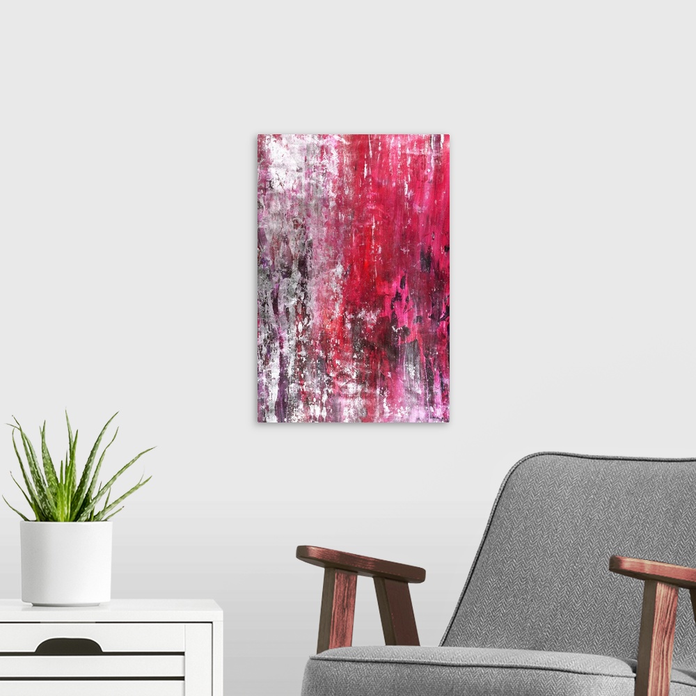 A modern room featuring Contemporary abstract painting in vibrant pink and red hues running vertically across the canvas ...