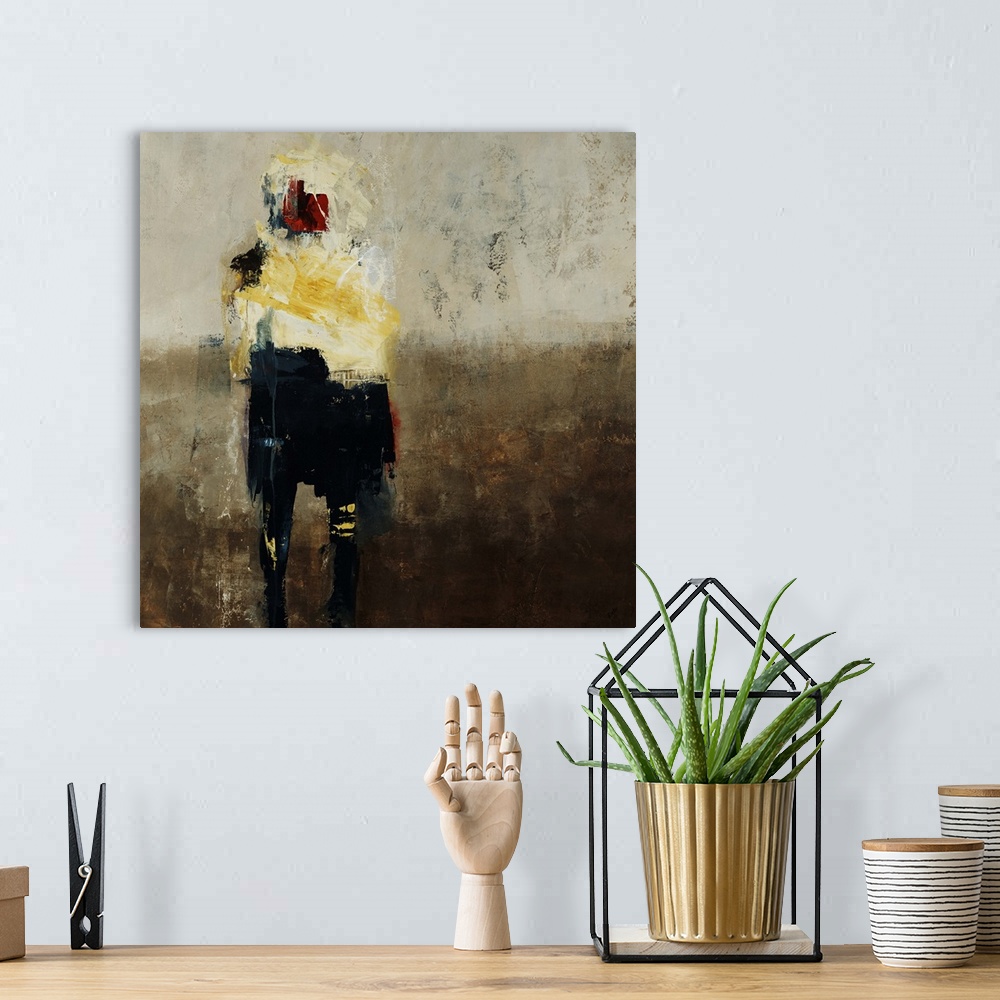 A bohemian room featuring Abstract painting of an alien or human figure in several colors, on a neutral toned background th...